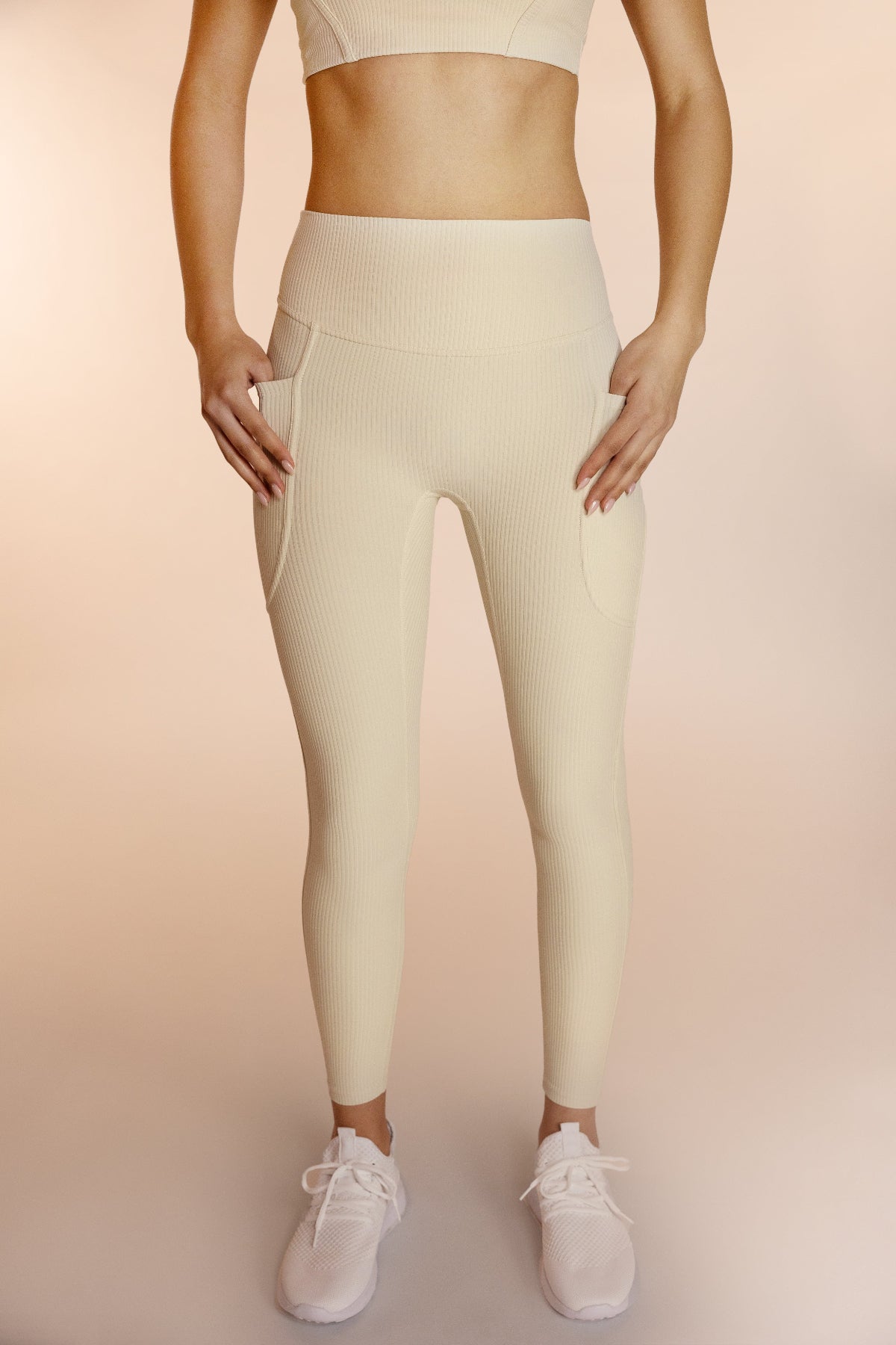Creme ribbed leggings with pockets front view