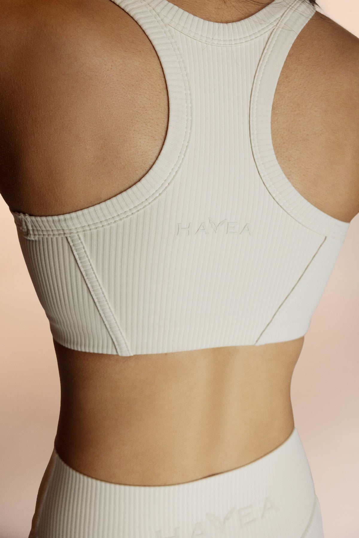 creme ribbed sports bra back