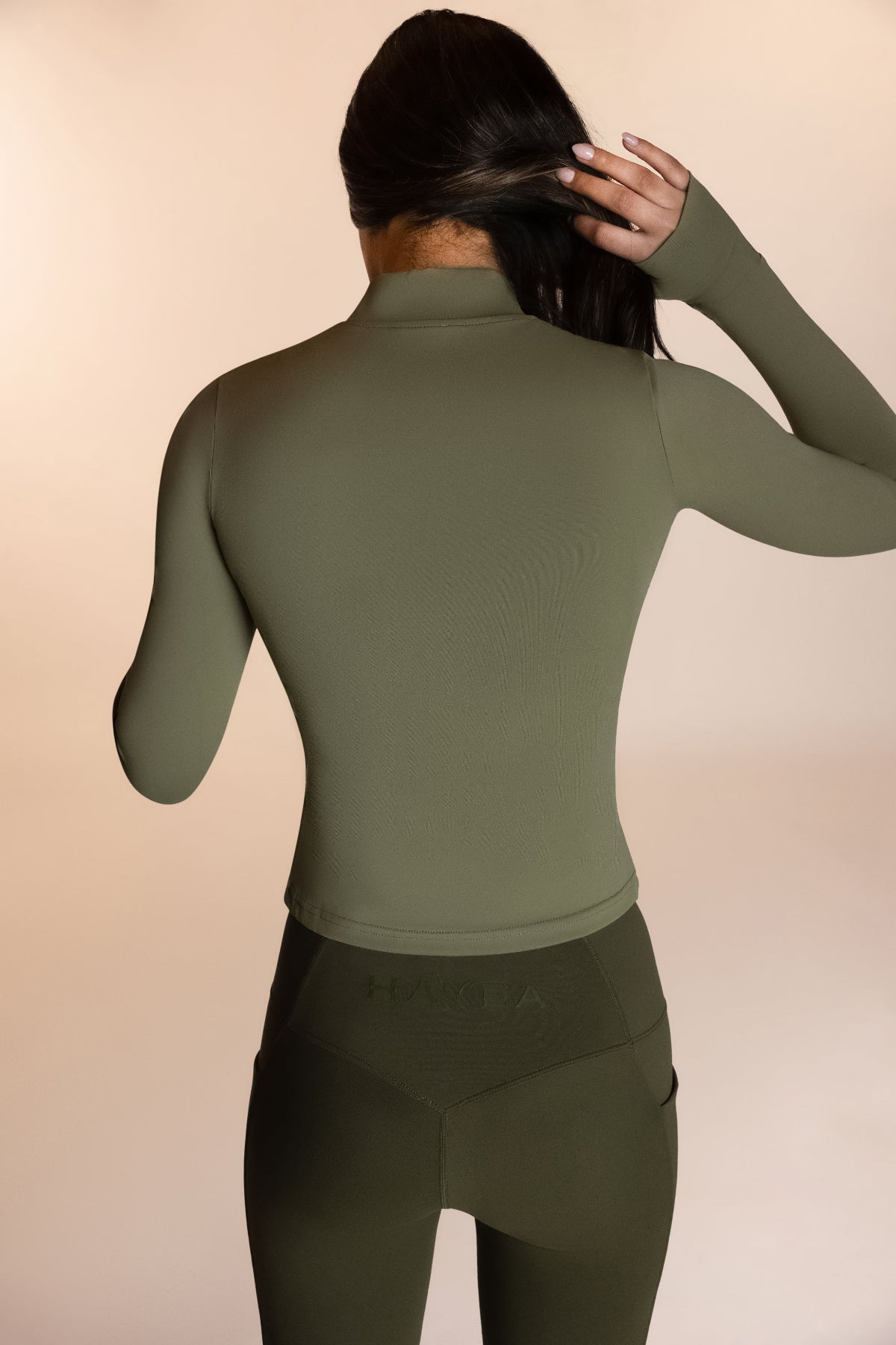 Green Form fitting women's running jacket
