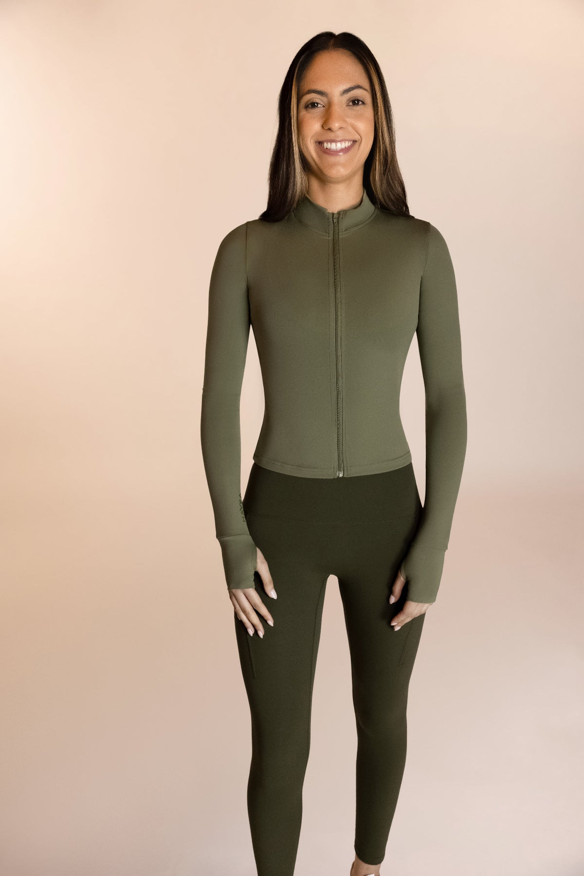 women's form fitting running jacket in green