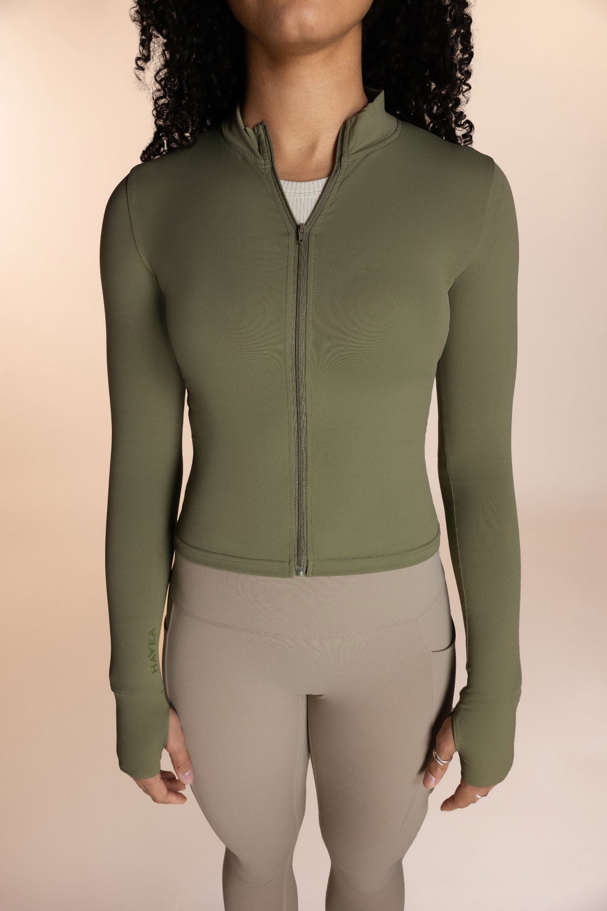 Women's green zip up running jacket
