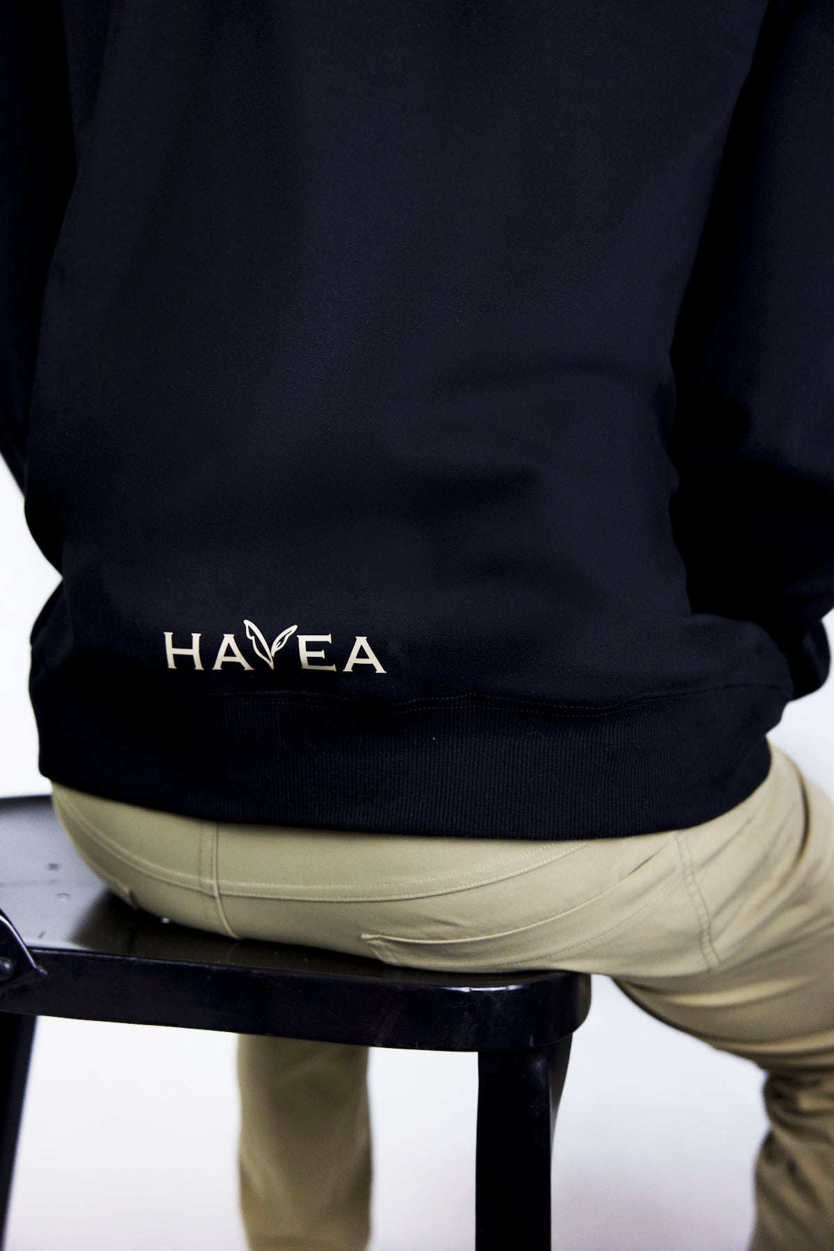Back of Black hoodie with bottom logo